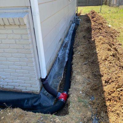 French drain being installed