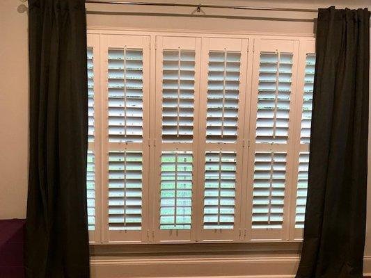 Cellular shades with arch, also blackout shade behind plantation shutter for maximum light blocking- Pinnacle 615-544-2510