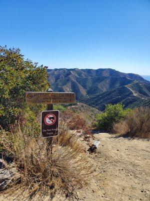 Sign marks end of trail at top