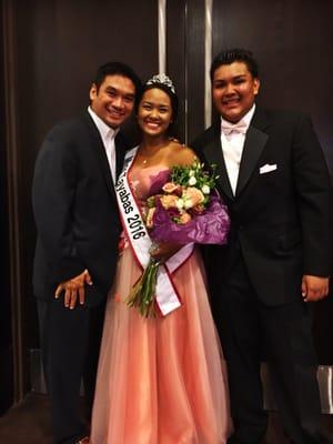 Cousin, goddaughter, and escort with her bouquet.