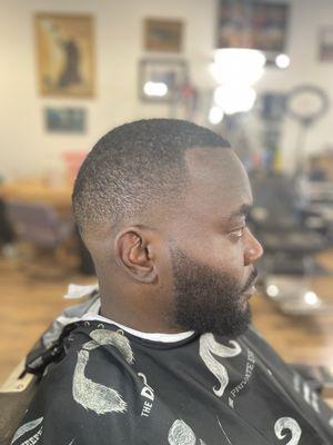 Mid skin fade with beard line up