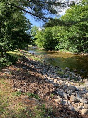 The Pemi river behind the cottages.