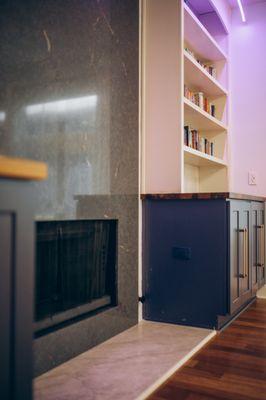 Built In Book Case with Taj Mahal Quartzite fireplace base and Silestone Quartz