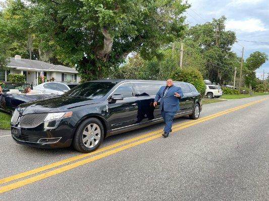 Our amazing driver,  Justin, and the beautiful limousine.