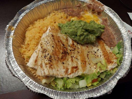 Lemon pepper mahi mahi dinner with refried beans and Mexican rice.