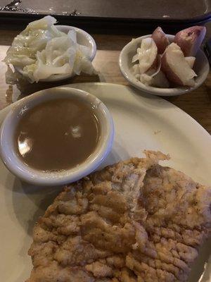 Schnitzel, cabbage, and red potatoes. YUM!  $8.95