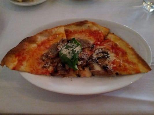 Sausage and mushroom pizza with home made mozzarella cheese. Yum!