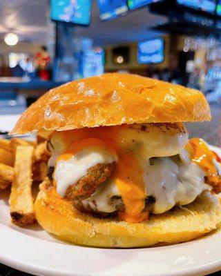 Fried Pickle Burger: 8 oz. Burger, fried pickles, pepper jack cheese, & boom boom sauce on a brioche bun