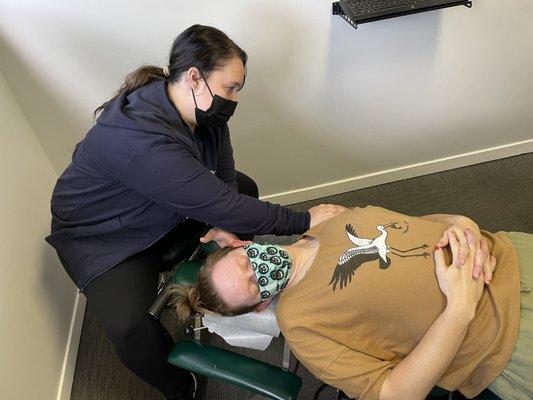 Dr. Bravo stretching the cervical spine. Chiropractic helps eliminate pain, improve mobility and improve overall well-being.