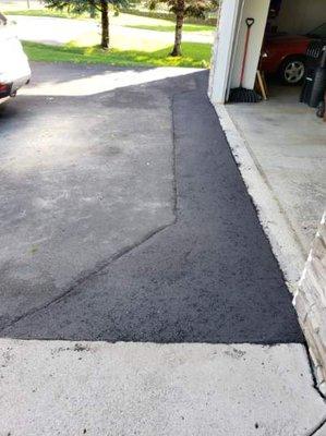 driveway was sinking near the garage and sidewalk, Seal King did an awesome job repairing it