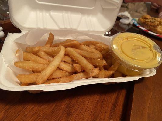 Fries with cheese on the side