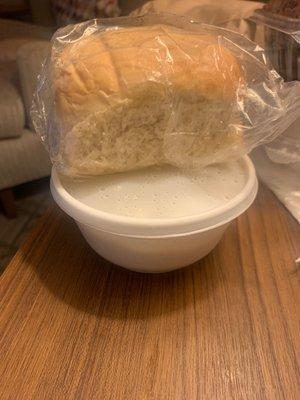 Plain white bread and chicken rice soup