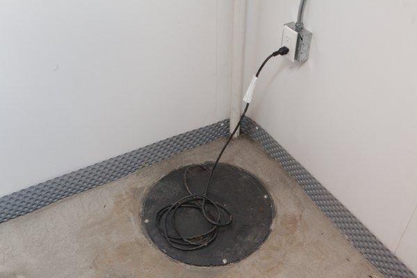 30" Deep Sump Basin Installed ( 1 Pc Lid Option) Discharge coming out of floor behind basin.