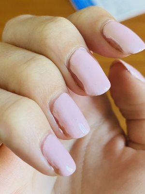 Sides of the nail left empty, skin stuck to nail polish on thumbs