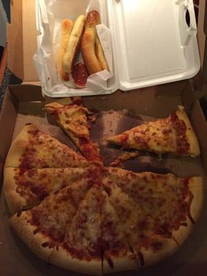 Soggy, bland pizza and breadsticks, that arrived cold after nearly an hour, even though I live just minutes away.