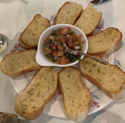 Complimentary garlic toast with salsa