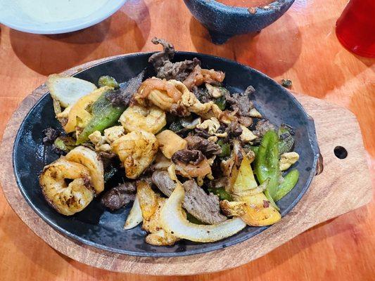 Shrimp chicken & beef fajitas  delicious!