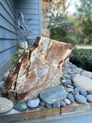 Boulder with Mexican beach pebbles.