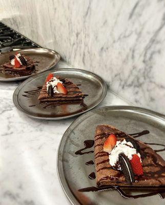 Double Chocolate Crepes with chocolate ganache & vanilla cream