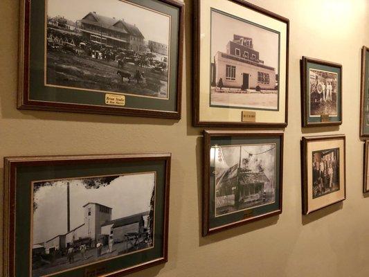 Historical photos of Eunice hang in the hallway leading to the restrooms.