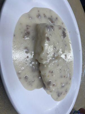 One biscuit with gravy. Very flavorful, sausage, gravy impressive!