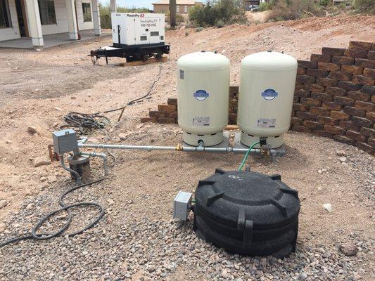 Underground 2500 Gallon Storage Tank Setup for two homes.