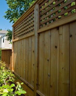 Cedar wood privacy wall built on a new cedar deck.