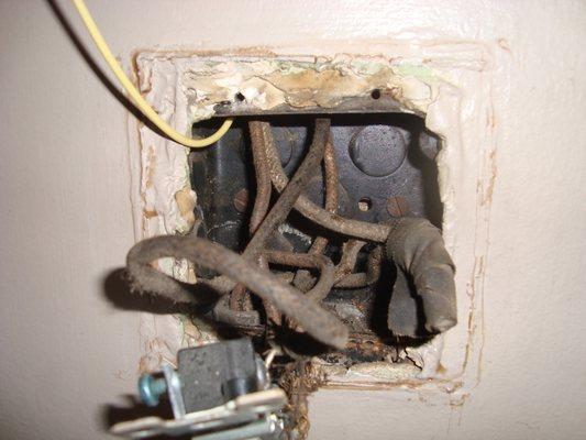 If your wiring looks like this with outdated cloth covered wire, rewiring is past due by about 40 years!