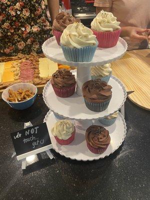 Chocolate and vanilla cupcakes with our baby's gender reveal inside :)