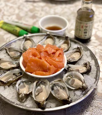 Shigoku oysters and salmon sashimi