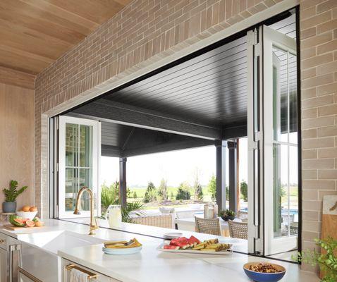 Windows on kitchen bar for indoor outdoor dining