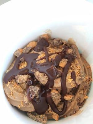 Nutella yogurt with Butterfinger and Reese's chunks topped with chocolate syrup from Menchies!