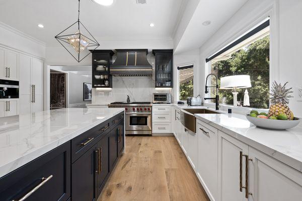 Timeless kitchen flooring, countertops and cabinet hardware.