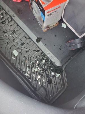 Broken glass inside my trunk.