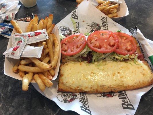 Ham and cheese grinder with baked French fries