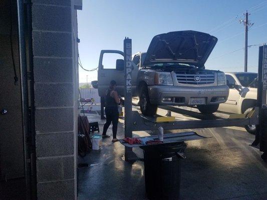 Sis working on her truck