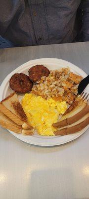 Salmon cakes, eggs, hash browns, and toast