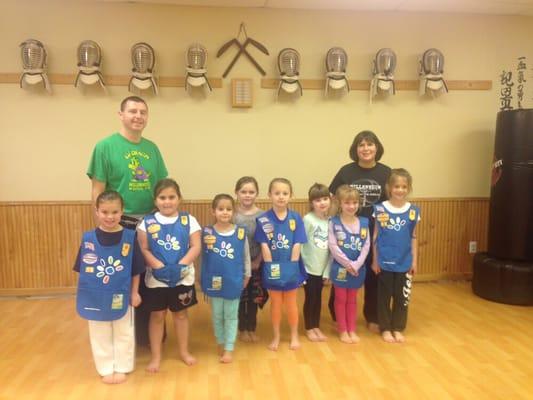 Millennium Martial Arts believes in community spirit. Here with a Daisy Girl Scout Troop during a recent free self defense class we donated.