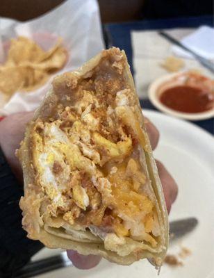 Chorizo Egg Cheese Burrito, added to beans