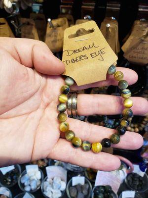 One wall of Sankofa Boutique is dedicated to a vast variety of beaded bracelets, including at least three varieties of tiger's eye.