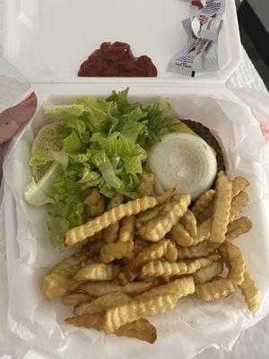 The fries weren't cooked enough and tasted freezer burnt. The burger had no flavor like it wasn't seasoned at all. Chopped lettuce on top.