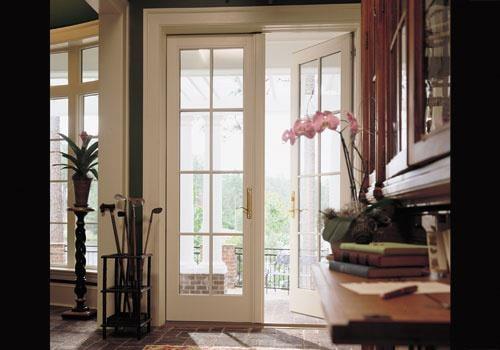 Andersen® hinged French patio doors are a timeless classic, various color and stain options available.