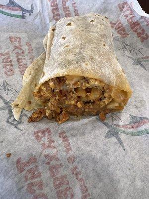 Half my chorizo breakfast burrito. It was enormous, I could only eat half.