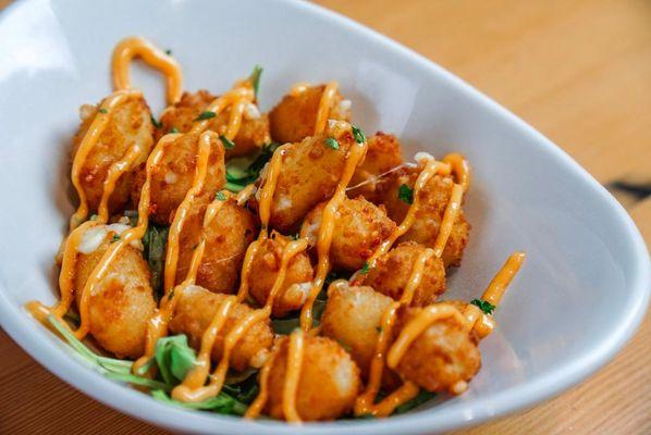 Cheese curds served with a spicy aioli and chives. Available only on our Happy Hour menu, 2- 5PM daily.