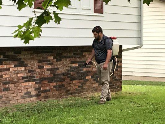 Joe Meagher treating a local Mt. Vernon home for bugs.