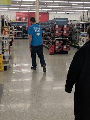 Staff wears t-shirts with cryptic messages