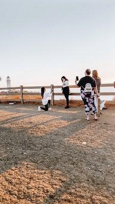 proposal by the ocean at sunset