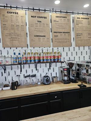 Behind the counter.  Notice the last menu board. How many coffee shops have THAT, and they actually do that work on site.