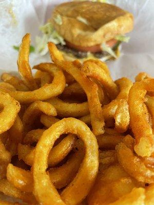 Lunch: a baby and curly fries!