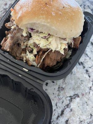 Brisket sandwich w/ Slaw and there White Sauce. I think that's a Bama sauce! The Brisket it self was